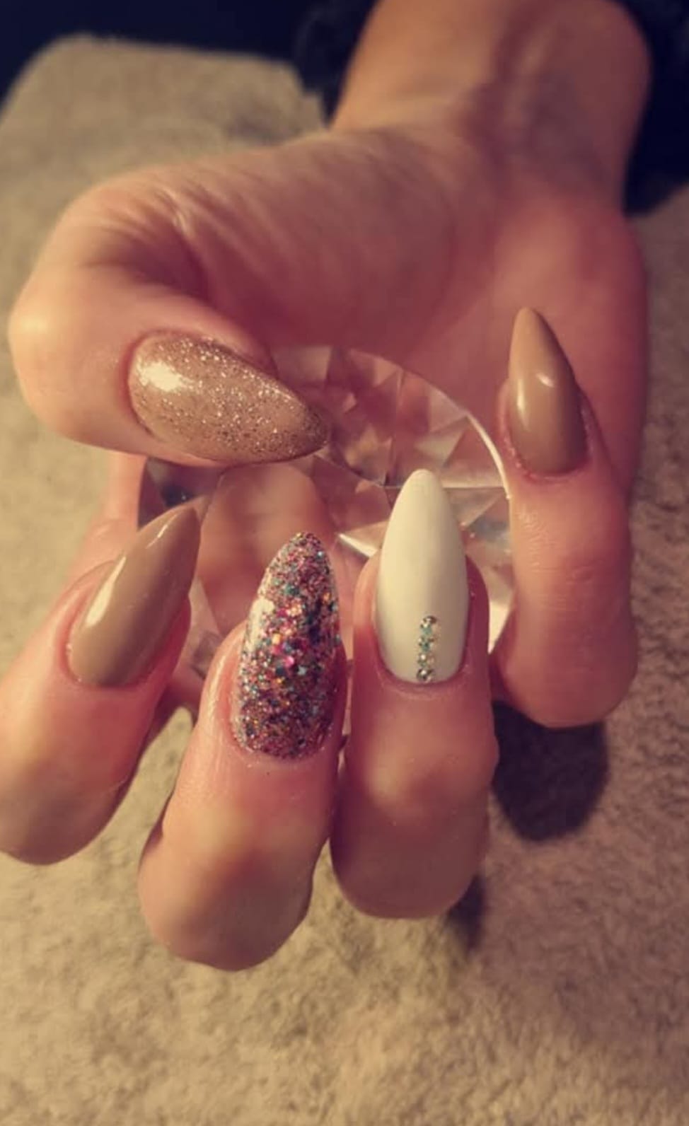 Christmas Emerald Nails - Festive emerald green with gold snowflake accents at Stella's Hair & Beauty Salon Barnsley