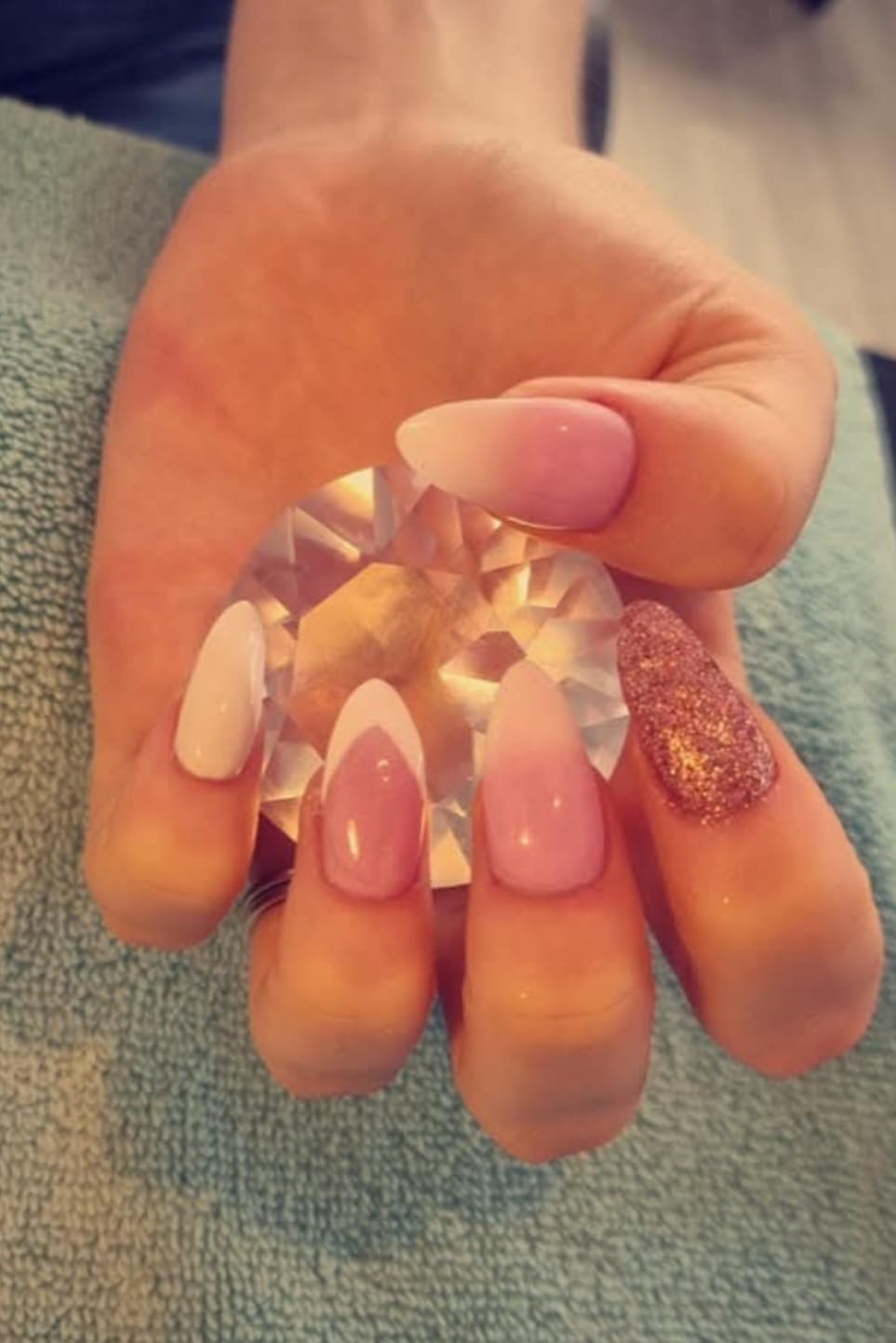 Elegant Mixed Design - Stiletto nails with gold glitter and crystal accents at Stella's Hair & Beauty Salon Barnsley