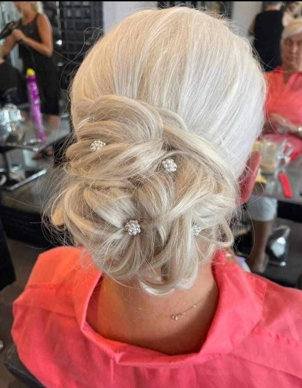 Crystal Pin Updo - Low updo with scattered crystal hair pins at Stella's Hair & Beauty Salon Barnsley