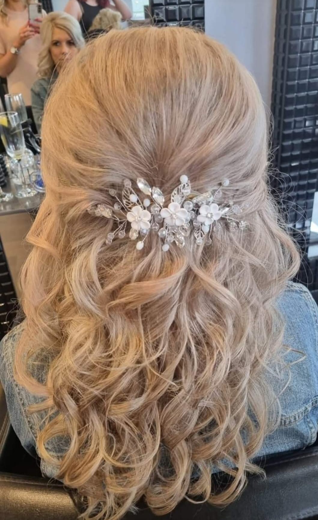Floral Hair Accessory - Half-up style with delicate floral accent at Stella's Hair & Beauty Salon Barnsley