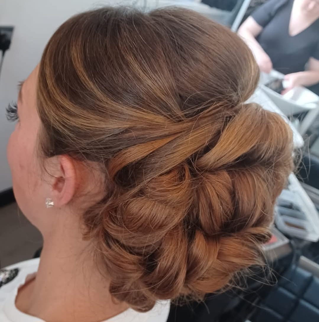 Side-Swept Updo - Elegant side-swept formal updo at Stella's Hair & Beauty Salon Barnsley